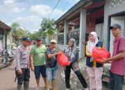 Polri dan TNI Bersinergi Lakukan Bhakti Sosial Pasca Banjir di Dompu