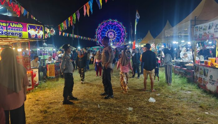 Polres Loteng Amankan Festival Pasar Malam Rona-Rona di Lapangan Peseng