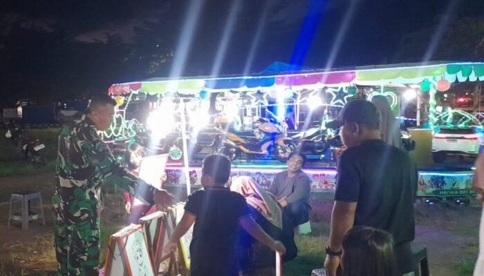 Komsos Humanis Babinsa Ciptakan Pasar Malam Kondusif dan Nyaman