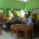 Bhabinkamtibmas Polres Bima Kota Monitoring Distribusi MBG untuk Siswa TK dan SD di Wilayah Rastim