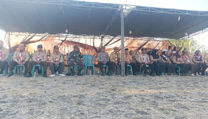 POLSEK HU’U AMANKAN UPACARA PEMBUKAAN PERKEMAHAN AKBAR HUT PRAMUKA KE-64